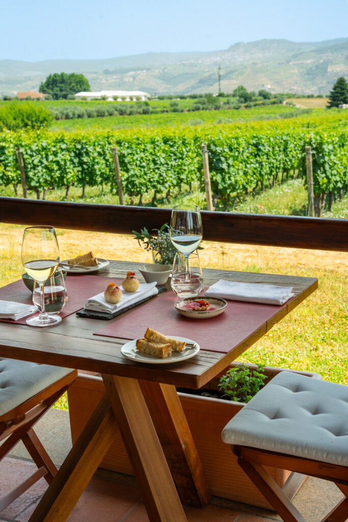 Casa Das Pipas restaurant table with view at The Manor House Celeirós, luxury wedding venue in Portugal