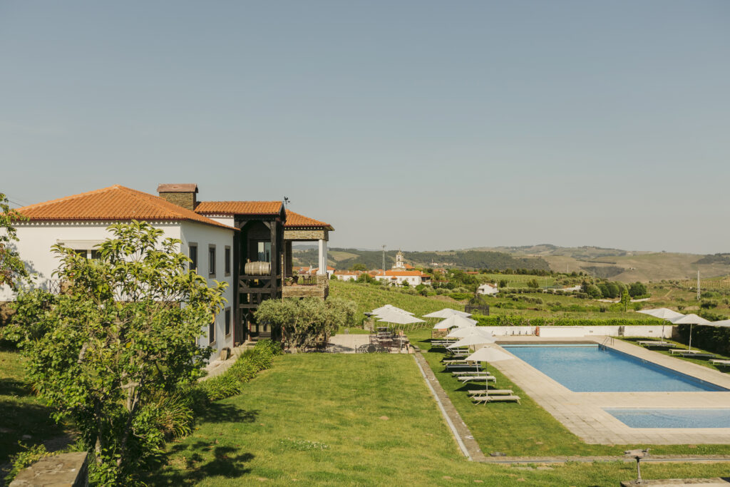 House and pool at The Manor House Celeirós, luxury wedding venue in Portugal