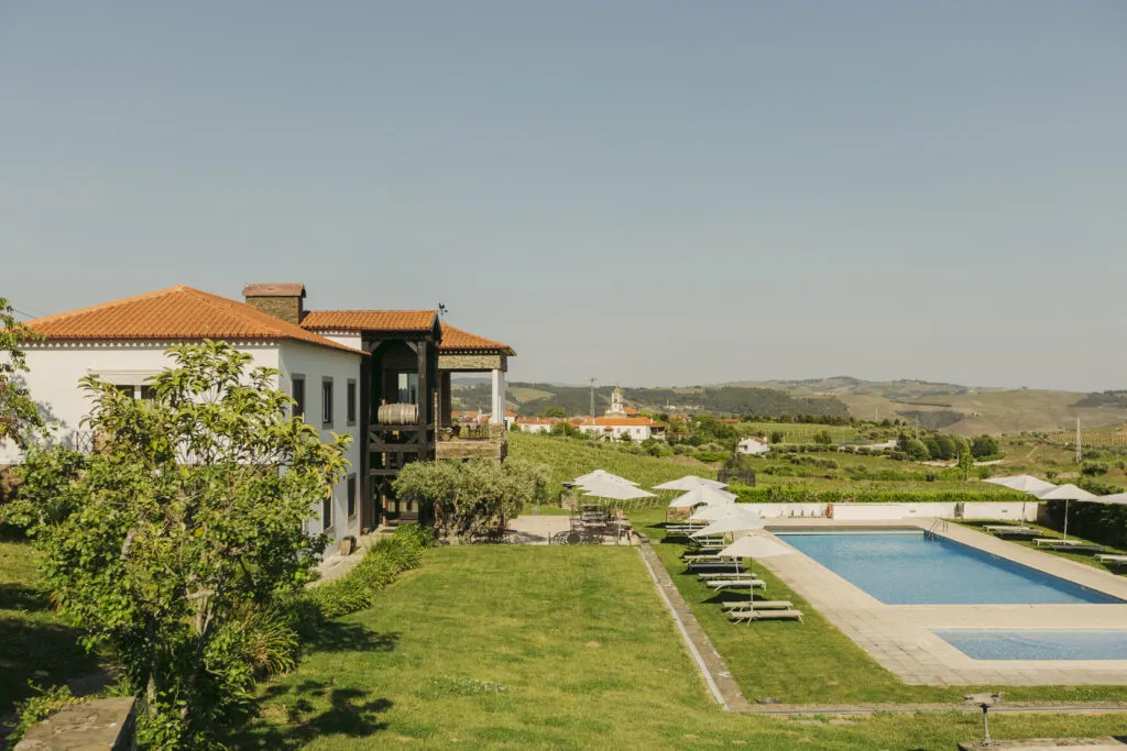 House and pool at The Manor House Celeirós, luxury wedding venue in Portugal