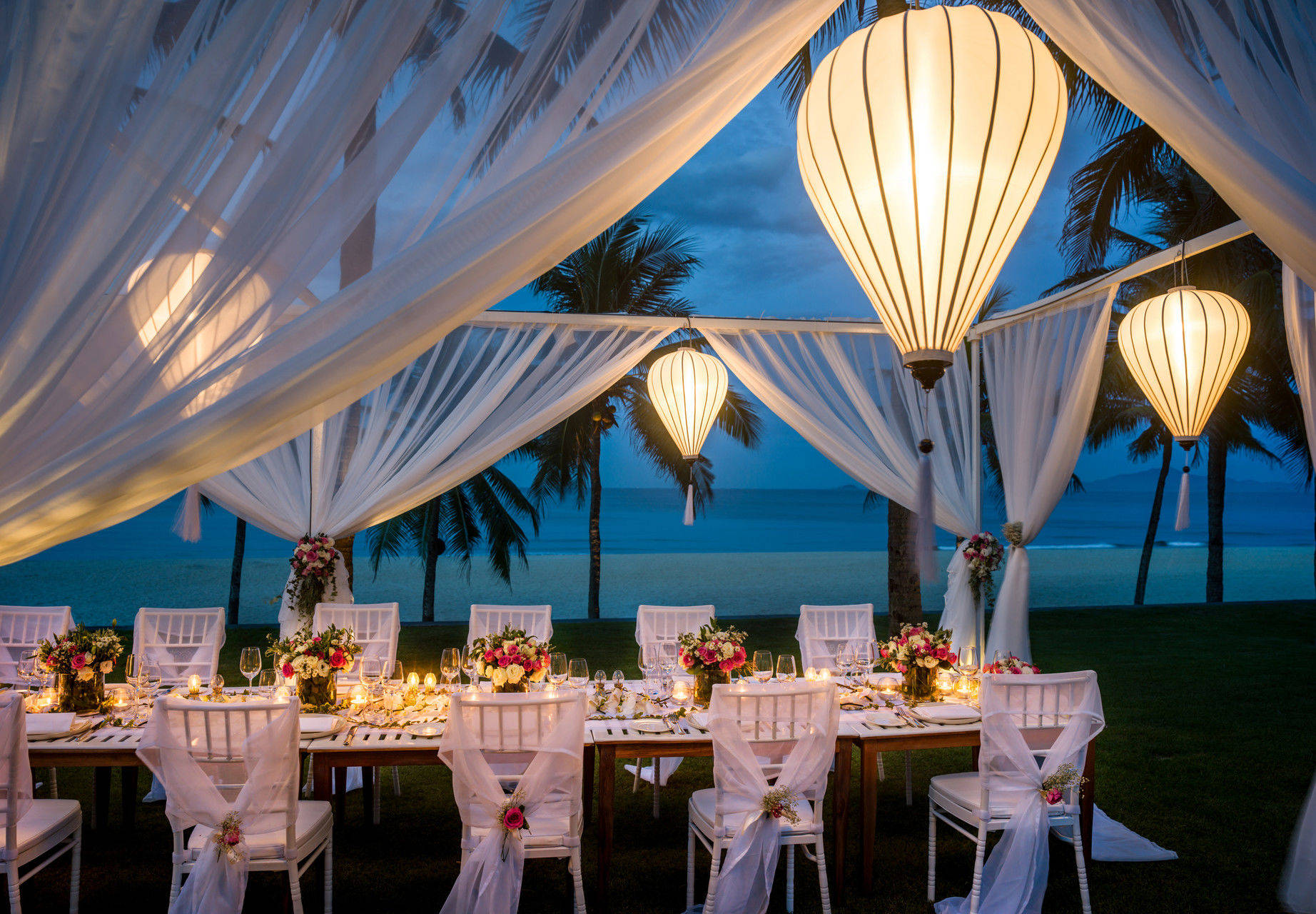 Atmospheric wedding reception outdoors