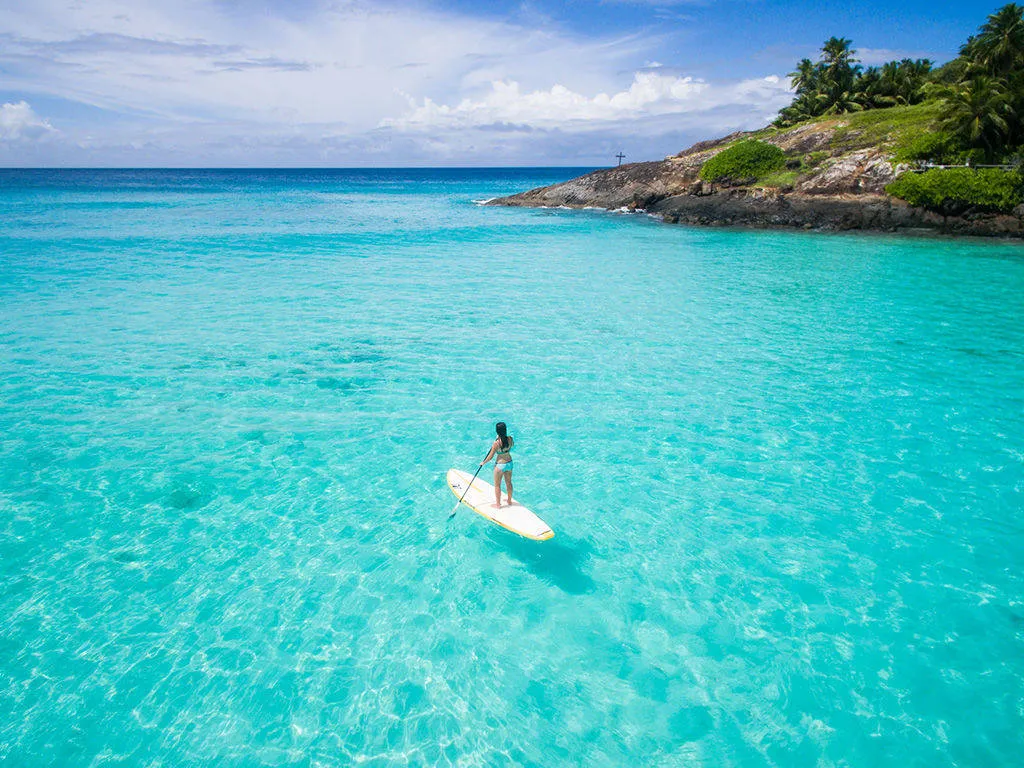 Surf paddling in the clear sea
