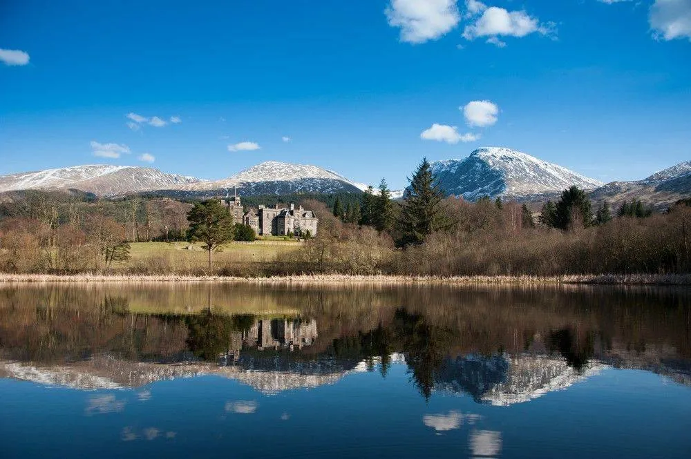 View of Inverlochy Castle Hotel across the lake