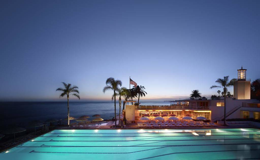 evening time swimming pool lit up at the Four Seasons Resort The Biltmore Santa Barbara