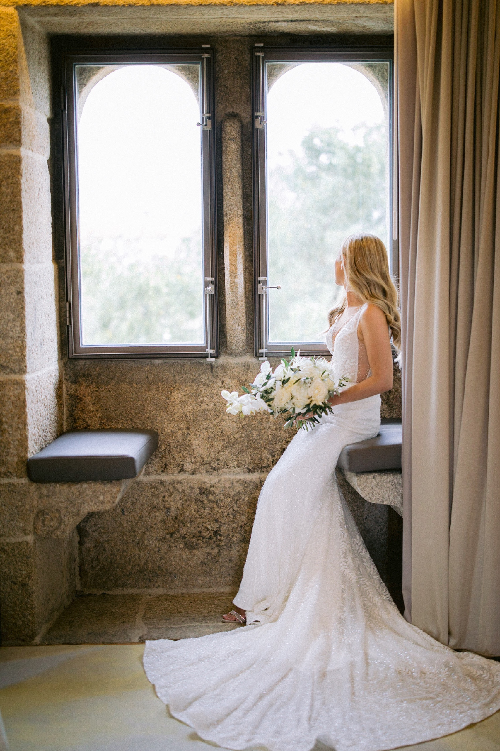 Bride on her wedding morning organised by Veil & Véu