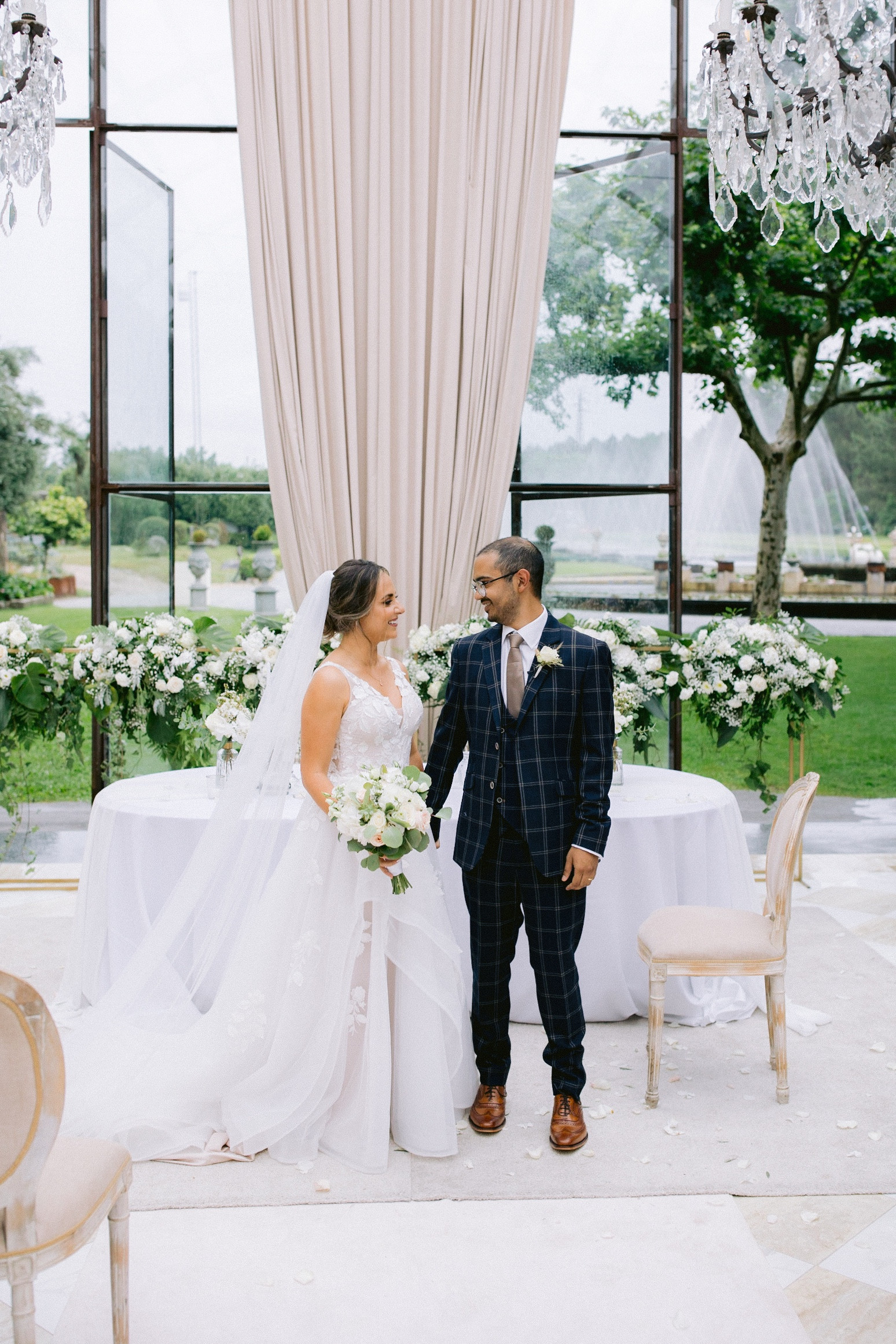 Bride & groom at their wedding ceremony organised by Veil & Véu